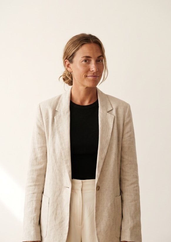 Mel, HR manager, in a linen blazer