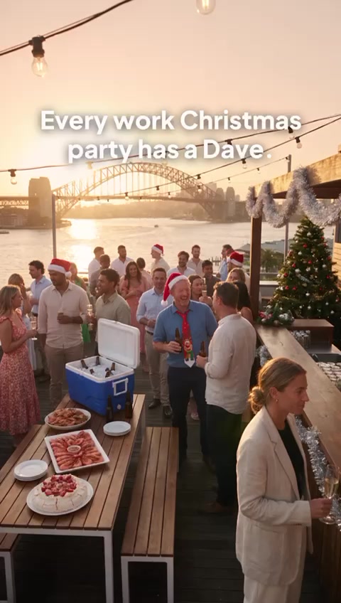 Work Christmas party on a harbour rooftop at sunset